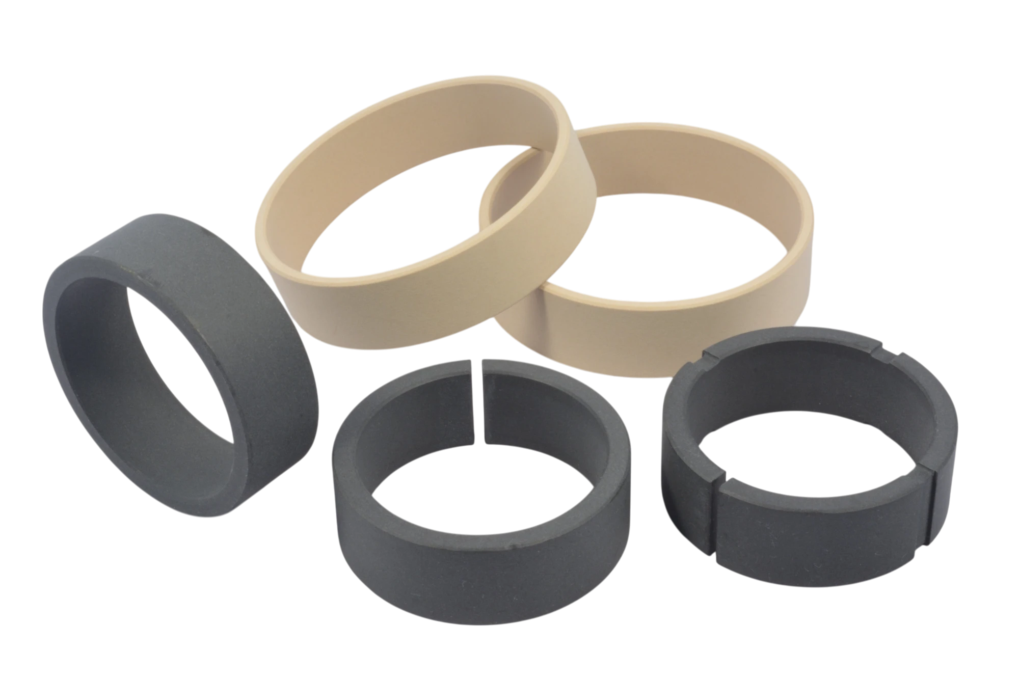 Interlocking beige and gray silicone rings arranged in a circle formation.