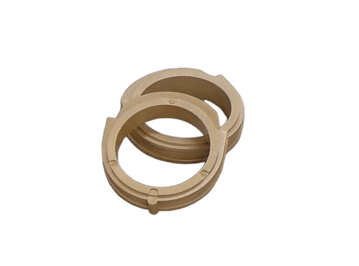 Two beige wooden ring clamps with small protrusions on a black background.
